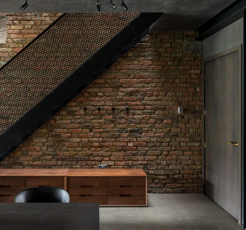 exposed brick wall in bedroom